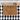 Personalized Christmas doormat with family names and year on a checkered rug.