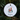 Round Christmas ornament with snowmen and text 'Our First Christmas as Mr & Mrs' on a green pine branch.